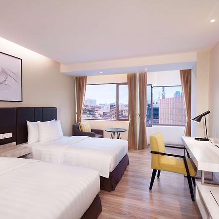 Aiho Hotel Medan Zimmer foto