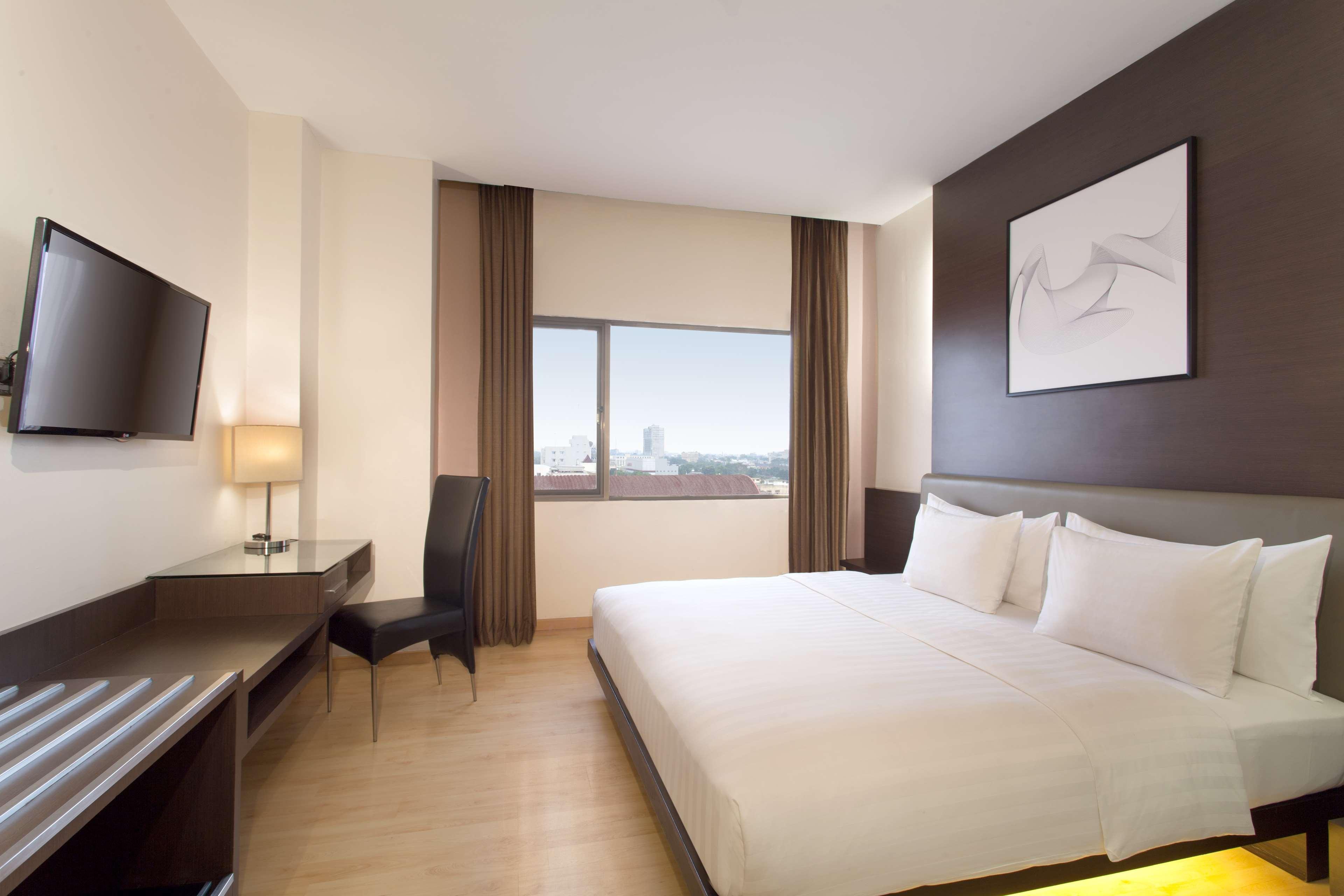 Aiho Hotel Medan Zimmer foto