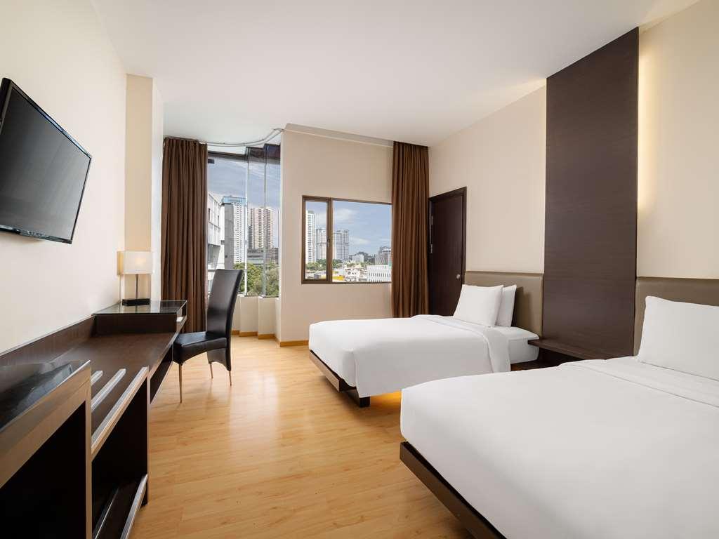 Aiho Hotel Medan Zimmer foto